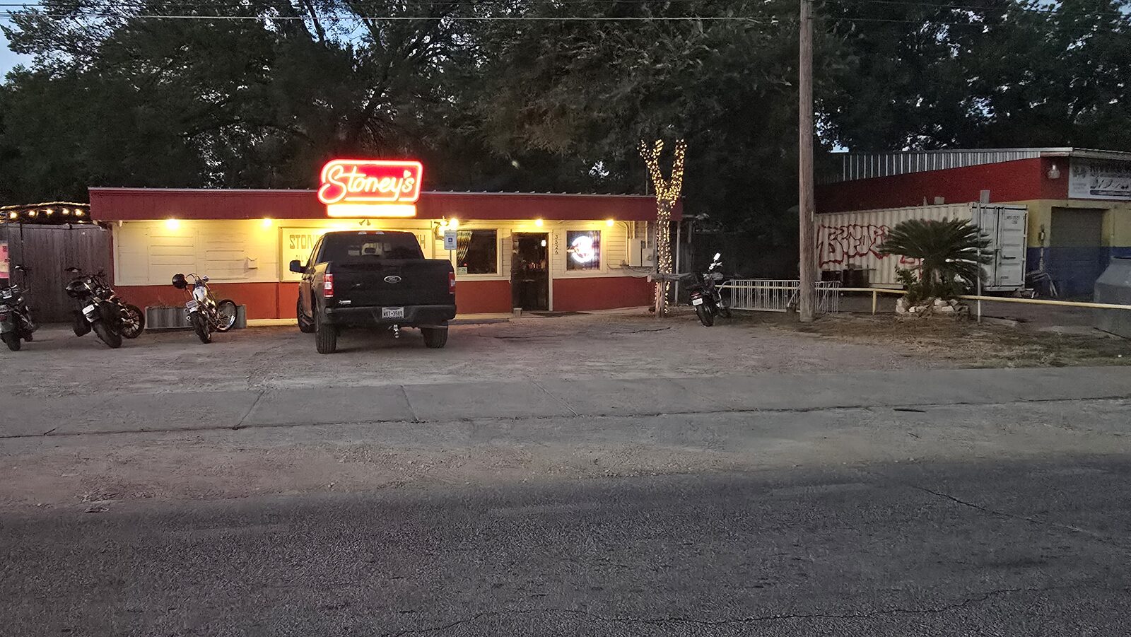 Sidney's roadhouse lit up at night on the drive home